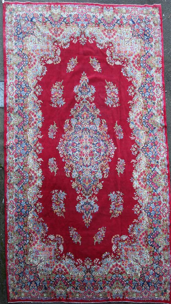 A North West Persian red ground carpet,